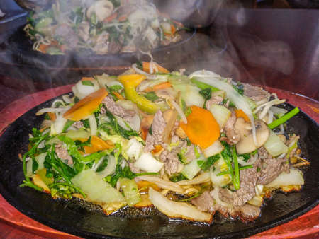 eating veal vegetables frying panの写真素材