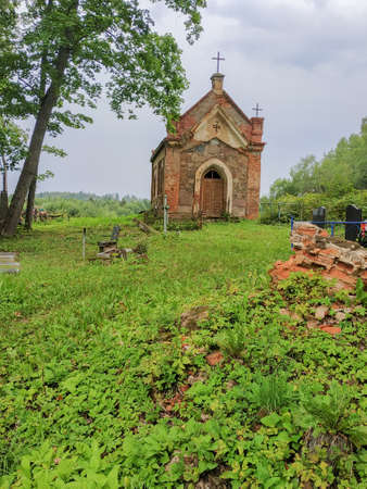 Grave crypt of bricks Ancient red brick crypt grave in an old cemeteryの写真素材