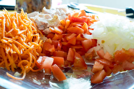 vegetable salad of tomato, carrot onion and chicken home recipeの写真素材