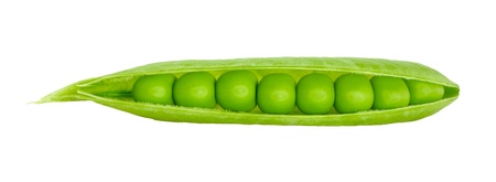 The opened pod of green peas on a white background.の写真素材