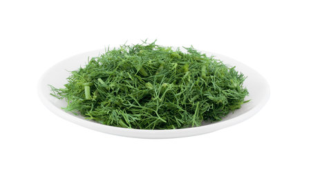 Dish with chopped dill on a white background.の写真素材
