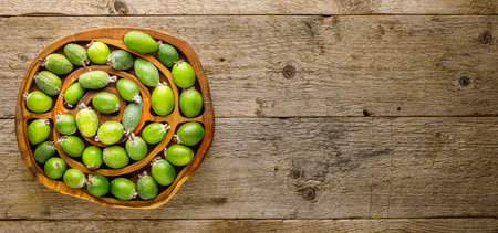 Still life with feijoa fruits and feijoa jam in the jarの写真素材