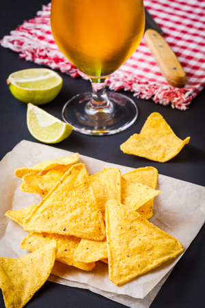 traditional mexican snacks nachos and beerの写真素材