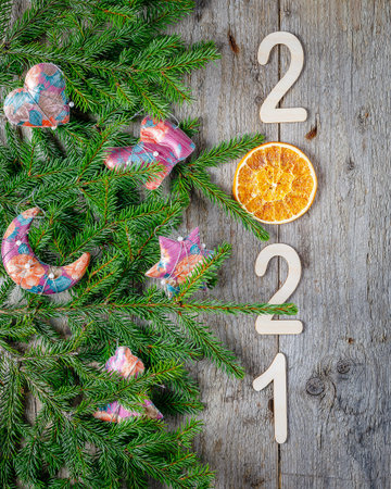 christmas greeting card with fir tree branches and seasonal decoration, copy spaceの写真素材