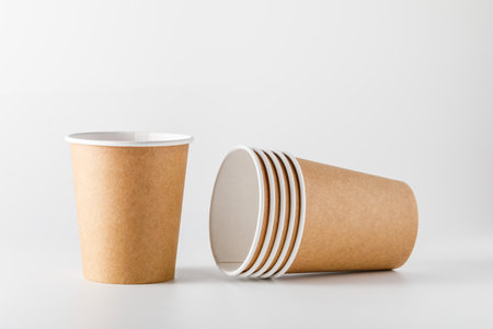 disposable paper cups isolated on white backgroundの写真素材