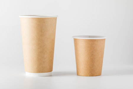 disposable paper cups isolated on white backgroundの写真素材