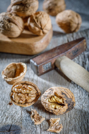 still life with walnuts on a wooden background and sackcloth