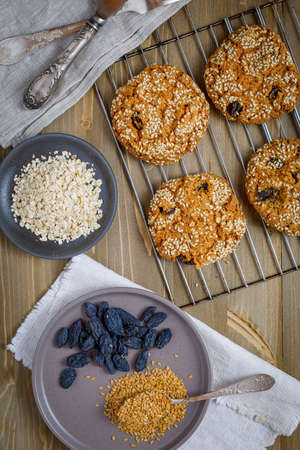 oatmeal cookies with raisins and sesame, ingredients for oatmeal cookiesの写真素材