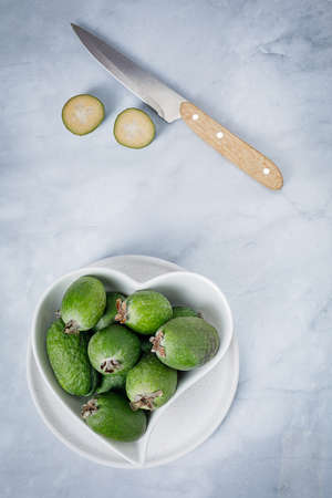 Fresh exotic feijoa fruits on a table, feijoa jamの写真素材