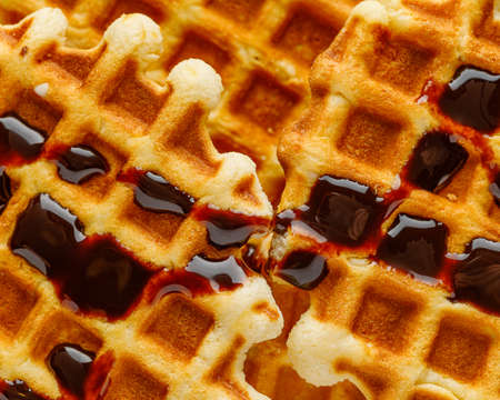 Homemade Belgium waffles served on a plate. Selective focus.の写真素材