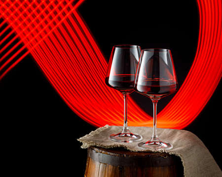 Glasses of red wine on black background, copy spaceの写真素材