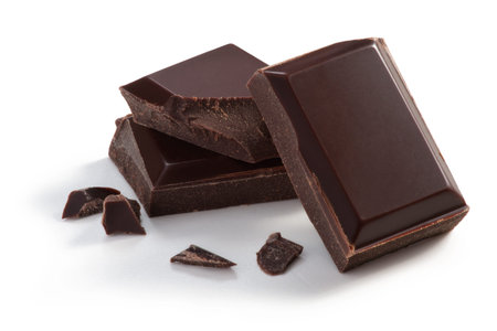 Three  pieces of Chocolate isolated on white, cleaned and retouched photo.