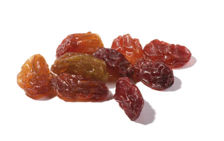 Pile of healthy raisins isolated on white background の写真素材