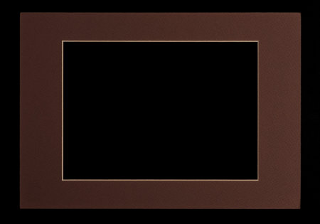 Brown matte cardboard picture frame   passepartout, cut out over black background 