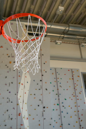 basketball hoop and indoor rock-climbing wall