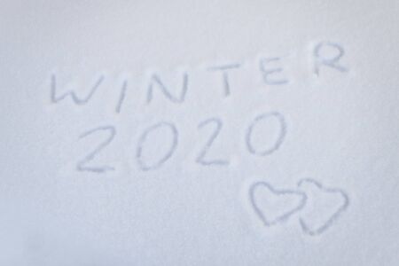 text winter 2020 two hearts on snow dayの写真素材
