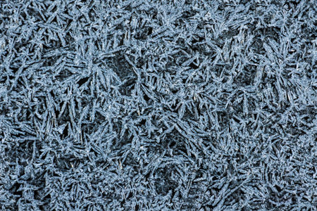texture blue frosty pattern on black glass seamless