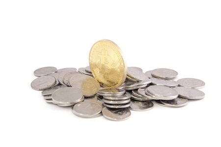 Bitcoin golden on top of other coins isolated on white background clipping pathの写真素材
