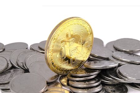 Bitcoin golden on top of other coins closeupの写真素材