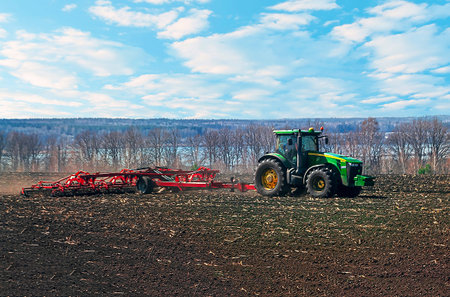 Penza, RUSSIA, 20 April 2019: tractor plows the field