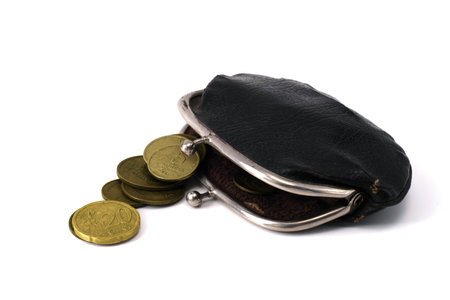 old vintage wallet and coins isolated on white background