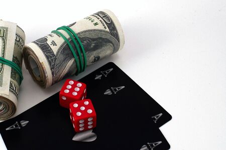 money playing cards dice on white backgroundの写真素材