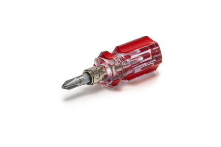 red-handled Phillips screwdriver isolated on white