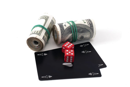 money playing cards dice on white background