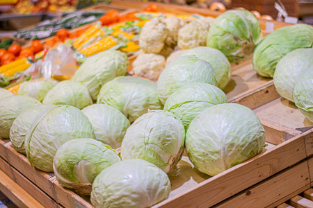 the cabbage in the boxes in the stores