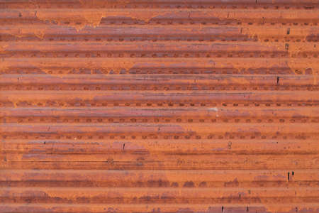 the old red metal surface of the steel plate. Industrial background and photo textures.の写真素材