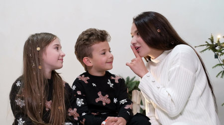 Mothers and children make wishes on New Years Eve. Fulfillment of desire. A fabulous Christmas