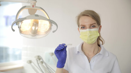 Female dentist in a modern clinic. Dentistryの写真素材