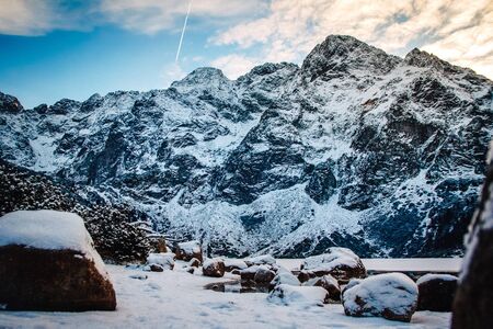 Mountains trees covered with snow.The trees are frozen.For backgroundの写真素材