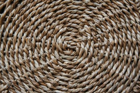 Structure and background of a wicker basket. Pattern of round texture. Close upの写真素材