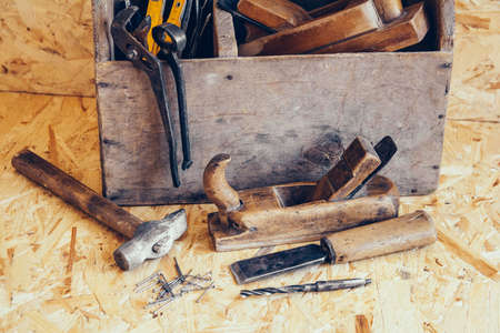 Old Wooden Tool Box Full of Tools. Old carpentry tools. Still lifeの写真素材