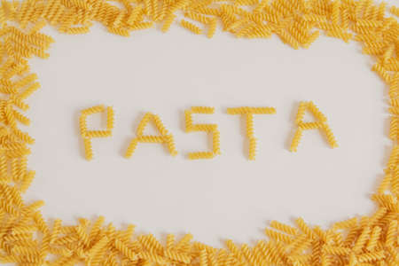 Inscription pasta on white background and frame around.Top view. Copy, empty space for text.の写真素材
