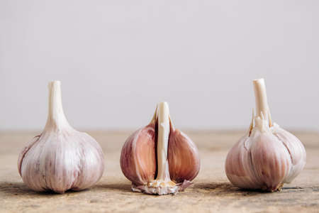 Garlic bulb on a rustic wooden background. Copy, empty space for text.の写真素材