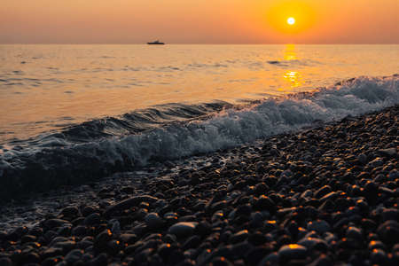 Sunset at sea. Variety of colors and hues of the rising sun.の写真素材