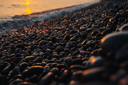 Gravel pattern of colored stones. Abstract nature pebbles background. Stone background. Sea peblles beach.の写真素材
