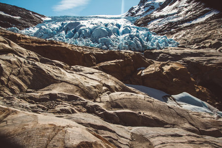 Beautiful scenery on the mountains and the glacier Svartisen landscape in Norway scandinavian nature landmarks ecology concept. Blue snow and ice.の写真素材