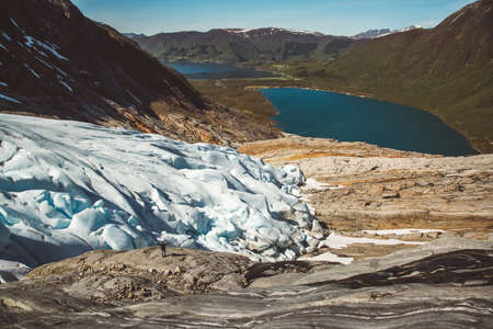 Beautiful scenery on the mountains and the glacier Svartisen landscape in Norway scandinavian nature landmarks ecology concept. Blue snow and ice.の写真素材