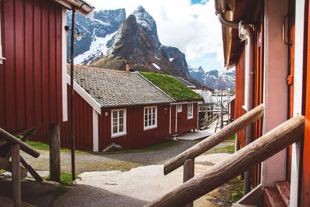 Norway rorbu houses and mountains rocks over fjord landscape scandinavian travel view Lofoten islands.のeditorial素材