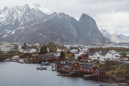 Norway rorbu houses and mountains rocks over fjord landscape scandinavian travel view Lofoten islands.のeditorial素材