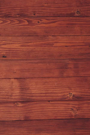 Wood shavings on black background. Background of fresh wood shavings. Copy, empty space for text.の写真素材