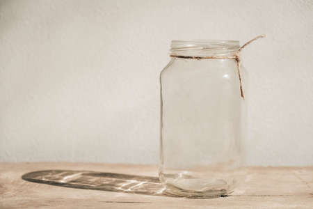 Wood drill bit with wooden shavings on black background. Copy, empty space for text.の写真素材