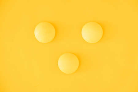 Silver gift box on yellow background. Top view. Copy, empty space for text.の写真素材