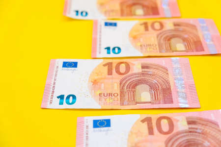 One dollar in hand on a white background. Copy, empty space for text.の写真素材