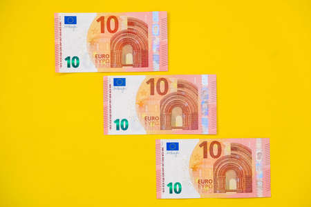 One dollar in hand on a white background. Copy, empty space for text.の写真素材