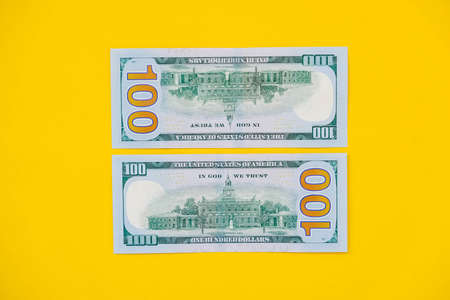 Euro banknotes on a yellow background. Top view. Copy, empty space for text.の写真素材