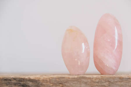 Violet amethyst crystal on wooden background. Copy, empty space for text.の写真素材